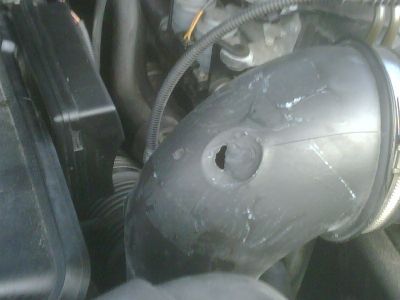 https://images.2carpros.com/forum/automotive_pictures/271991_hole_in_inlet_1.jpg