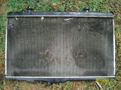 https://images.2carpros.com/forum/automotive_pictures/293795_Front_of_Radiator_3.jpg