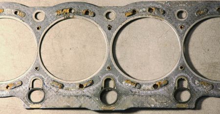 https://images.2carpros.com/forum/automotive_pictures/298324_HeadGasket_1.jpg