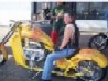 https://images.2carpros.com/forum/automotive_pictures/320318_Me_Smaller_Image_Yellow_Bike_1.jpg