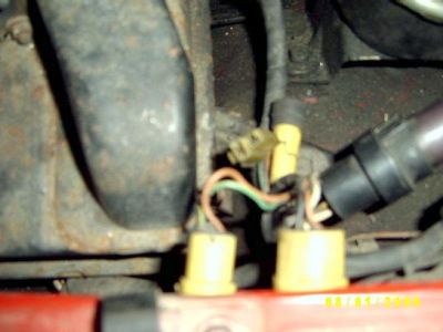 https://images.2carpros.com/forum/automotive_pictures/385694_1985_Toyota_4_Runner_underhood_with_two_connectors_mounted_in_grommets_1.jpg