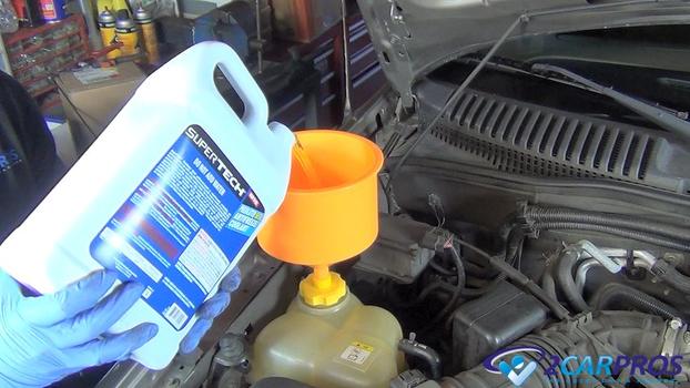 adding engine coolant