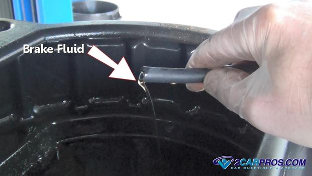 brake fluid coming out of tube