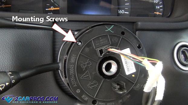 clock spring mounting screws