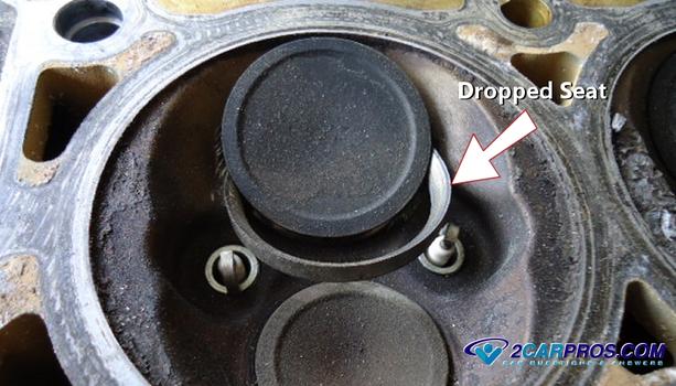 dropped automtoive engine cylinder head intake valve seat