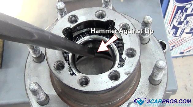 hammer against bearing race lip