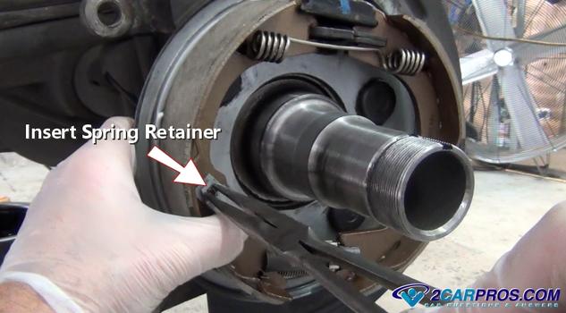insert parking brake shoe retainer clip