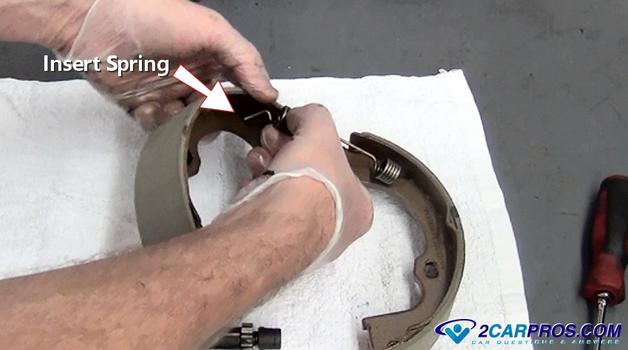 insert return spring parking brake shoe