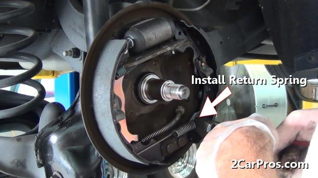 install brake shoe return spring