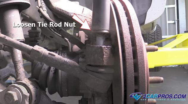 loosen tie rod nut