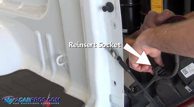 reinsert reverse light bulb socket