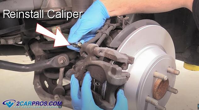 reinstall rear brake caliper