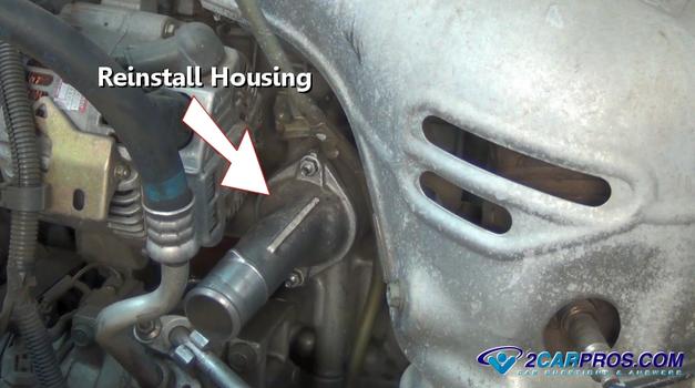 reinstall thermostat housing