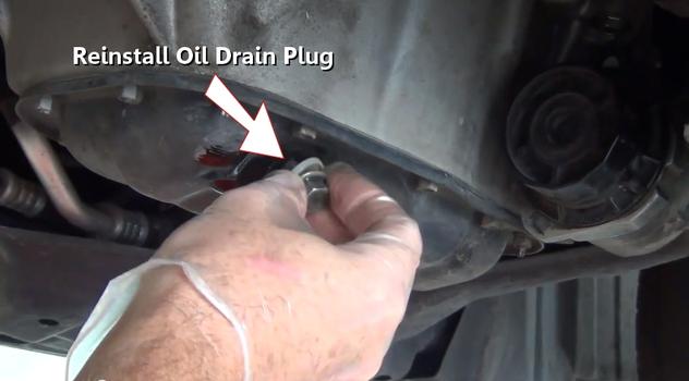 reinstall oil drain plug