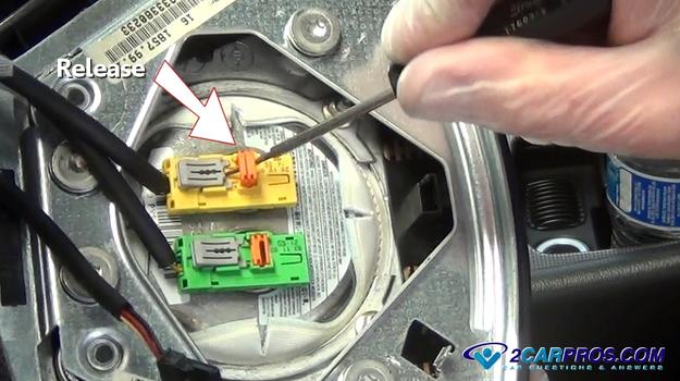 release secondary airbag safety clip