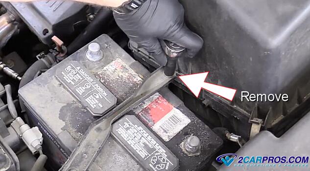 remove battery hold down strap