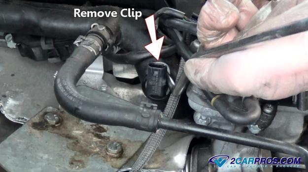 remove coolant temperature sensor retainer clip