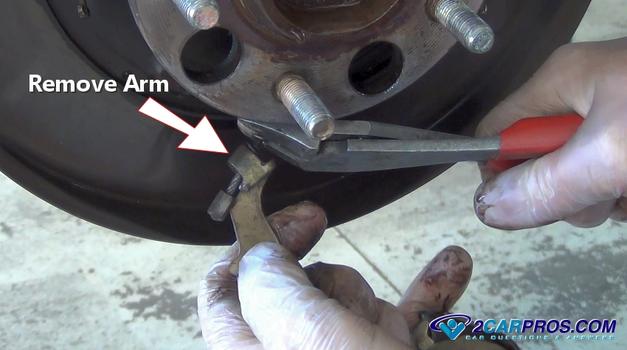 remove parking brake shoe arm