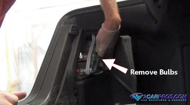 remove turn signal bulb housing