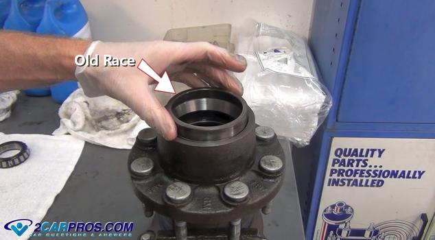 set old bearing race onto new bearing race