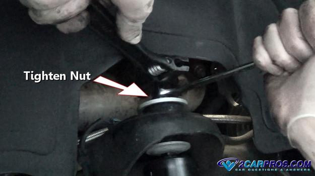 tighten shock upper nut