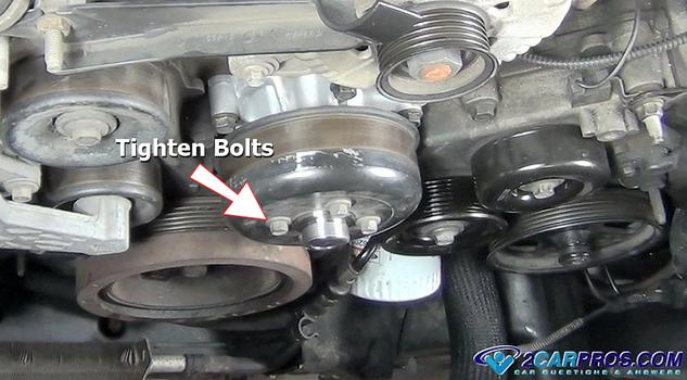 tighten water pump pulley bolts